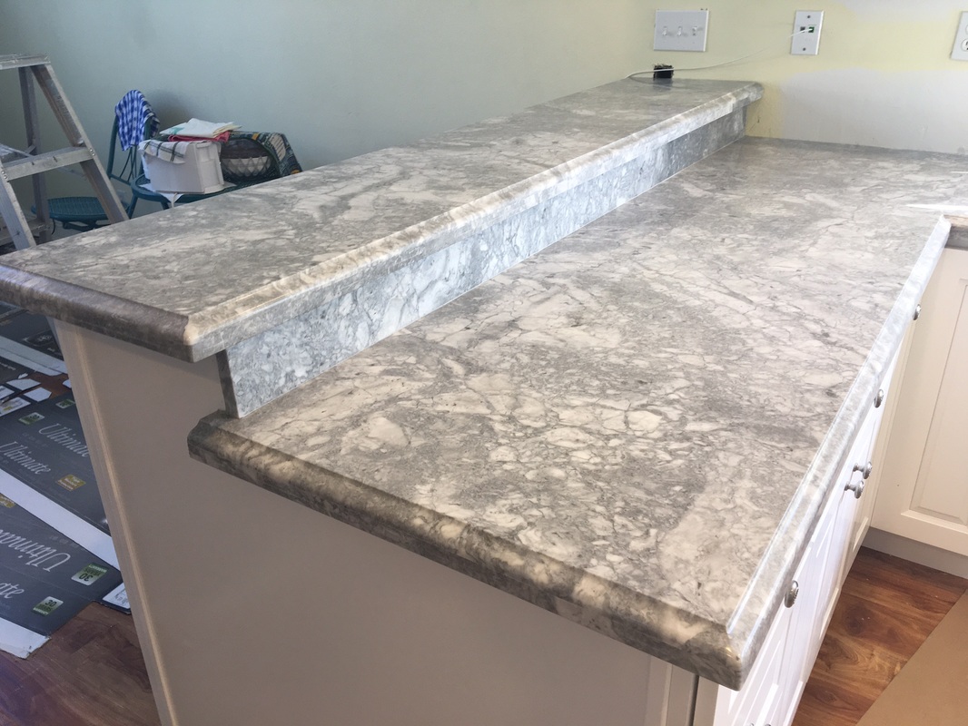 white snow bay cabinets WITH QUARTZITE COUNTERTOP OGEE FLAT EDGE FOR ...